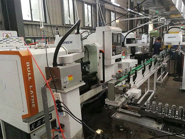 Notkun Adtech-Robot í sjálfvirkri hleðslu og affermingu á CNC rennibekk